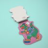 Colorful cartoon dinosaur paper cutout with accessories, digital art, on pink background, playful design, trendy illustration, fun and vibrant art style.
