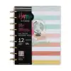 Bright colorful 12-month teacher planner with classic layout, whimsical globe design, and stylish gold spiral binding, perfect for organizing school year lessons and activities.