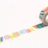 Colorful decorative washi tape with various patterns, ideal for crafts, scrapbooking, and gift wrapping.