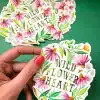 Bright floral sticker with the quote 