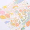 Colorful whimsical wrapping paper featuring rainbows, balloons, stars, flowers, and cheerful characters, perfect for gift wrapping at The Wraperie. Bright pastel tones create a fun and magical presentation.
