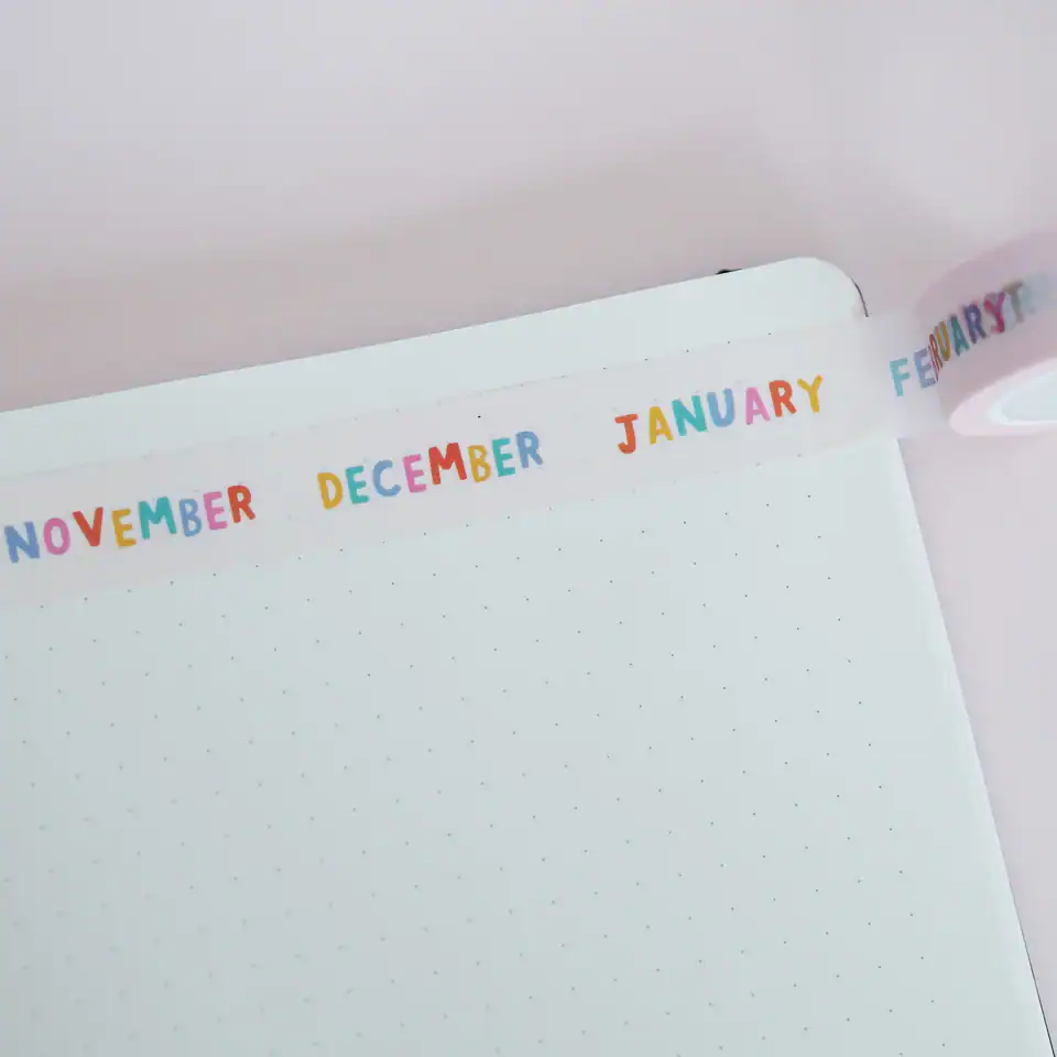 Colorful monthly headers for bullet journal or planner, featuring months from November to February in vibrant, eye-catching letters. Perfect for organized planning and creative journaling.
