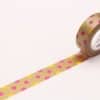 Colorful decorative washi tape with pink and gold polka dot pattern, perfect for craft projects and gift wrapping.