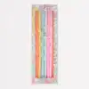 Rainbow-colored birthday candles with pastel wrapping, perfect for celebrations and party decor from The Wraperie. Brighten your special occasion with these festive and colorful candles.