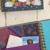 Vibrant scrapbook featuring floral, animal, and decorative designs, perfect for personalized crafts and creative projects.