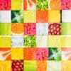Vibrant assorted fruit salad cubes with watermelon, pineapple, kiwi, strawberries, oranges, and melons, perfect for fresh fruit bowls or smoothies.