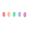Colorful macarons in pastel shades of pink, peach, green, blue, and purple displayed on a plain background, showcasing dessert variety and vibrant bakery treats.
