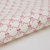 Bows pink sorbet block printed gift wrap